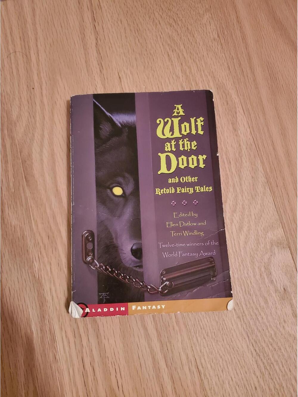 A Wolf at the Door and Other Retold Fairy Tales - Paperback Book